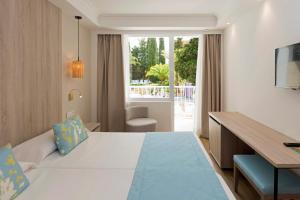 Twin Room with Pool View room in HSM Hotel S'Olivera