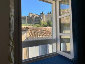 Jolie Vue Cité, aux pieds des remparts