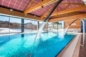 Hotels Village vacances Chalet de la Haute-Joux : photos des chambres