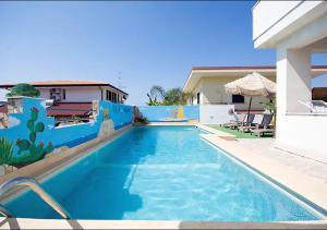 Apartma Villa Paglianiti - Your Family Residence Briatico Italija