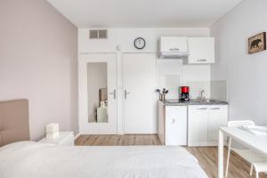 Appartements Le Petit Magny : photos des chambres