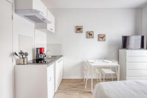 Appartements Le Petit Magny : photos des chambres