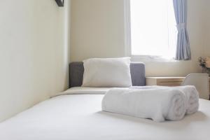 Homey 2BR Apartment at Grand Palace Kemayoran By Travelio