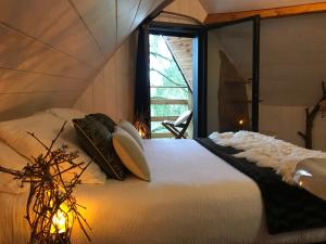 Campings Cabane dans les arbres avec spa Les Cabanes de Koad'dour : photos des chambres