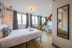 Appartements Apartments WS Saint-Lazare - Lafayette : photos des chambres