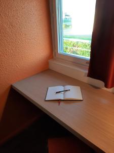 Hotels Premiere Classe Macon Sud : photos des chambres