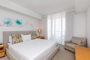 One-Bedroom Apartment room in Private Ocean Luxury Condos at Beachwalk Resort condo