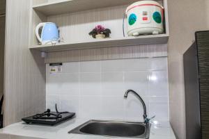 Minimalist Studio Apartment with City View at M-Town Residence By Travelio