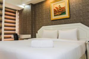 Minimalist Studio Apartment with City View at M-Town Residence By Travelio