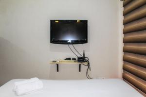 Minimalist Studio Apartment with City View at M-Town Residence By Travelio