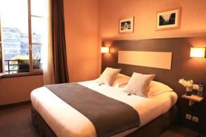 Hotels Logis Hotel Marguerite d'Anjou : photos des chambres