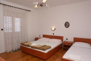Two-Bedroom Apartment with Balcony and Sea View room in Apartments and rooms by the sea Novalja Pag - 4067