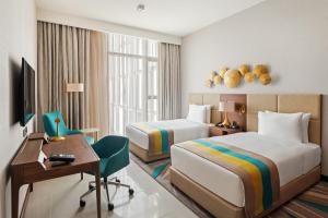 Deluxe King or Twin Room room in Holiday Inn Dubai Al-Maktoum Airport