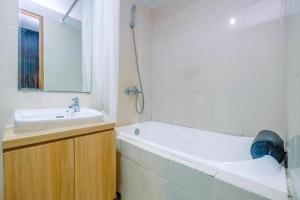 Warm and Cozy Studio at The Oasis Cikarang Apartment By Travelio