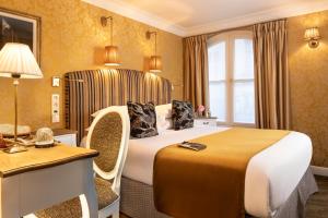 Hotels Odeon Hotel : photos des chambres