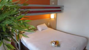 Hotels Premiere Classe Macon Sud : Chambre Triple (1 Lit Double et 1 Lit Simple) - Non remboursable