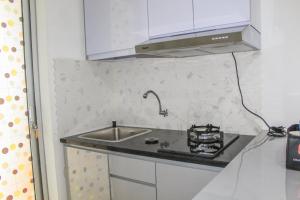 Comfy 2BR Apartment Bassura City near Shopping Mall By Travelio
