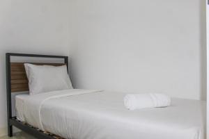 Comfy 2BR Apartment Bassura City near Shopping Mall By Travelio