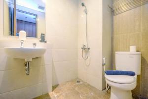 Homey and Relaxing Studio @ Grand Dhika City Apartment By Travelio