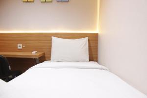 Exquisite 2BR Apartment at Taman Sari La Grande near BIP By Travelio