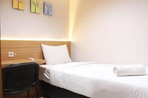 Exquisite 2BR Apartment at Taman Sari La Grande near BIP By Travelio