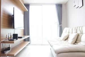 Exquisite 2BR Apartment at Taman Sari La Grande near BIP By Travelio