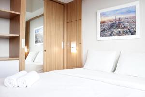 Exquisite 2BR Apartment at Taman Sari La Grande near BIP By Travelio