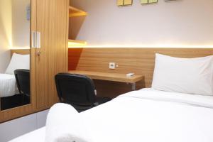 Exquisite 2BR Apartment at Taman Sari La Grande near BIP By Travelio