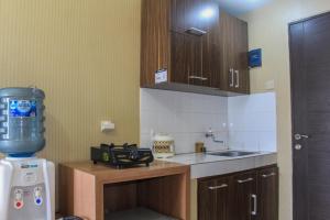 Affordable Price Studio at Sky View Apartment By Travelio