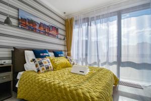 One-Bedroom Apartment room in Designer Apartments On Ilyich Square