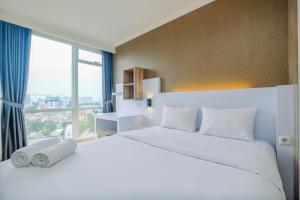 Warm and Cozy Studio at Menteng Park Apartment By Travelio