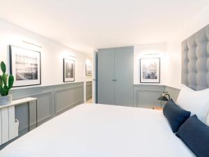 Appartements LivinParis - Luxury 4 Bedrooms Le Louvre I : photos des chambres