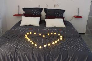 Appartements Nuit romantique avec Jacuzzi SPA privatif proche TOULOUSE : photos des chambres