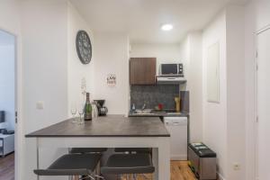 Appartements Appartement Confort Paris : photos des chambres