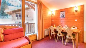 Appart'hotels Vacanceole - Residence Les Chalets de la Ramoure : photos des chambres