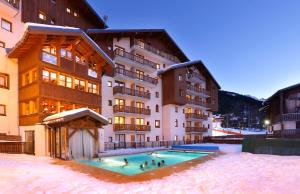 Appart'hotels Vacanceole - Residence Les Chalets de la Ramoure : photos des chambres