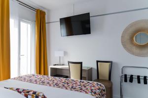 Hotels Le Rabelais : photos des chambres