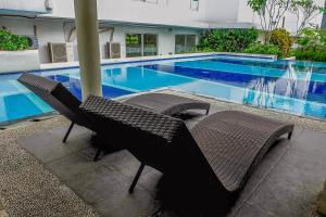 Cozy Living Studio Apartment at Bassura City By Travelio