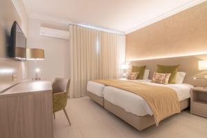 Twin Room room in Loule Jardim Hotel