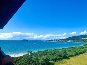 Jurerê Beach Village - Flat na Praia