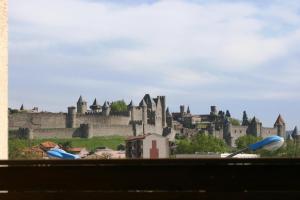 Appartements Le Balcon sur la Cite : photos des chambres