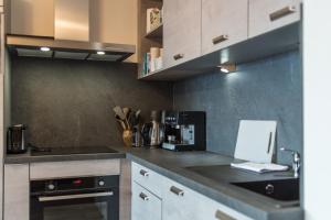 Appartements ODYSSEE B102 Cosy appartement sur les pistes : photos des chambres