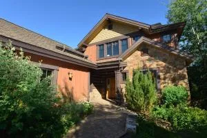 Red Tail on the River by Casago McCall - Donerightmanagement - Lowman