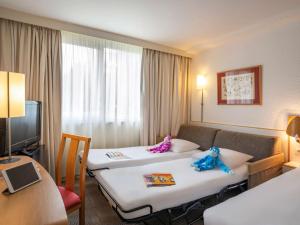 Hotels Novotel Evry Courcouronnes : photos des chambres