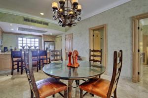 Villa La Estancia Condo Pools, Hot Tub, and Balcony