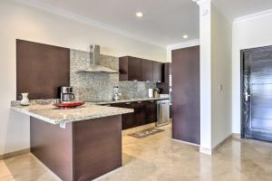 Walk to Beach Modern Cabo Condo with Balcony!