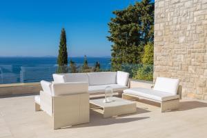 Luxury Seafront Villa Primosten Glamour with private pool, sauna and gym at the beach in Primosten