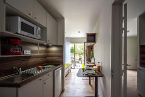 Appart'hotels ATHOME RESIDENCE ET SPA : photos des chambres