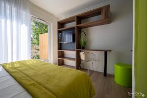 Appart'hotels ATHOME RESIDENCE ET SPA : photos des chambres