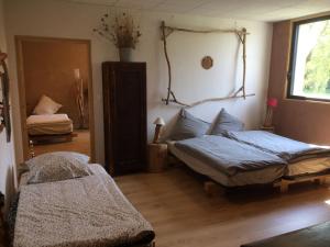 Appartements Holiday home on farm (La Ferme du Tao) : photos des chambres